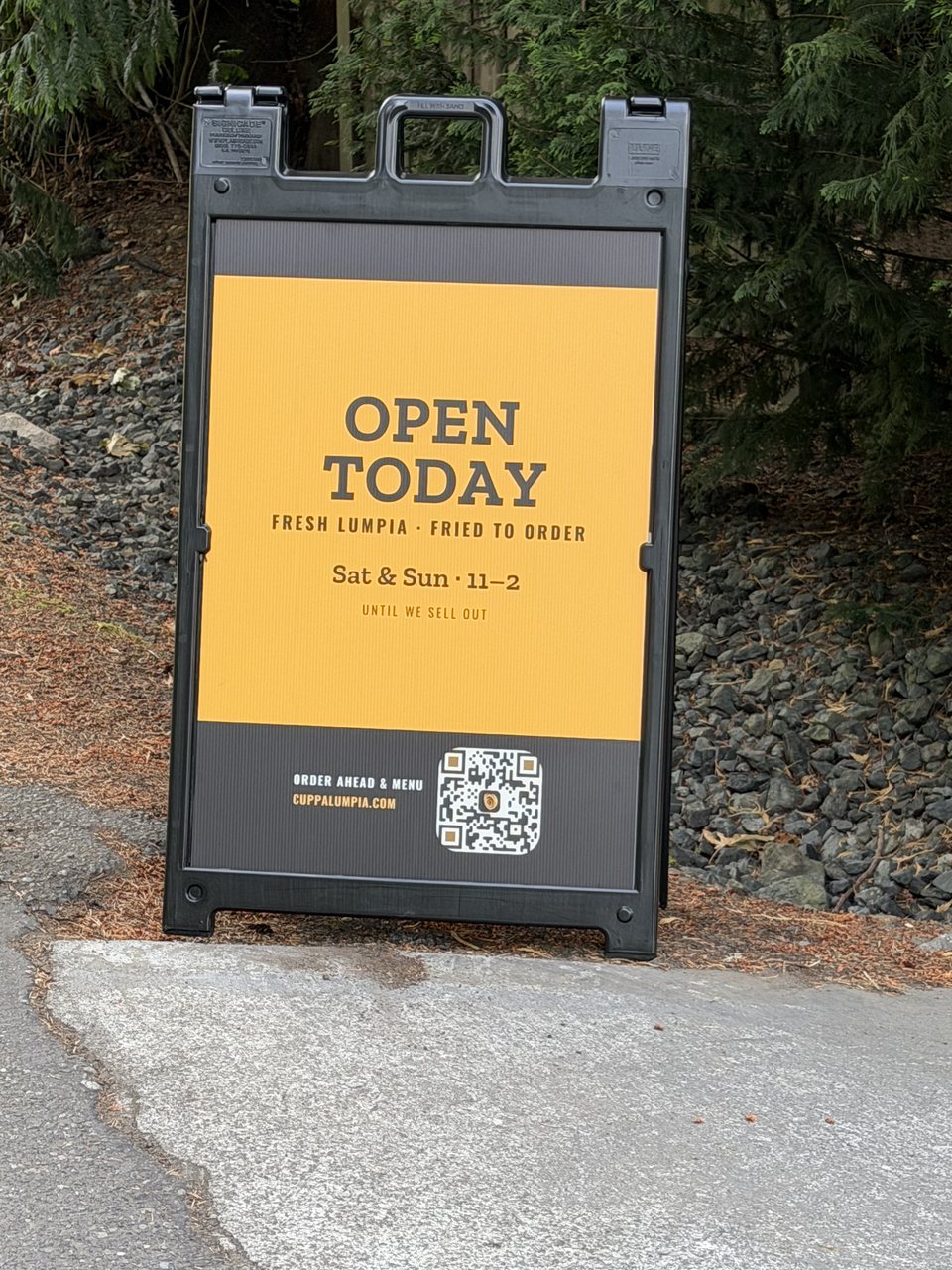 The Open Today A-frame board at the end of the driveway